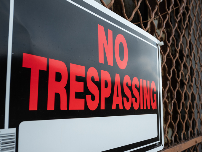 A No Trespassing Sign on an Abandoned Building